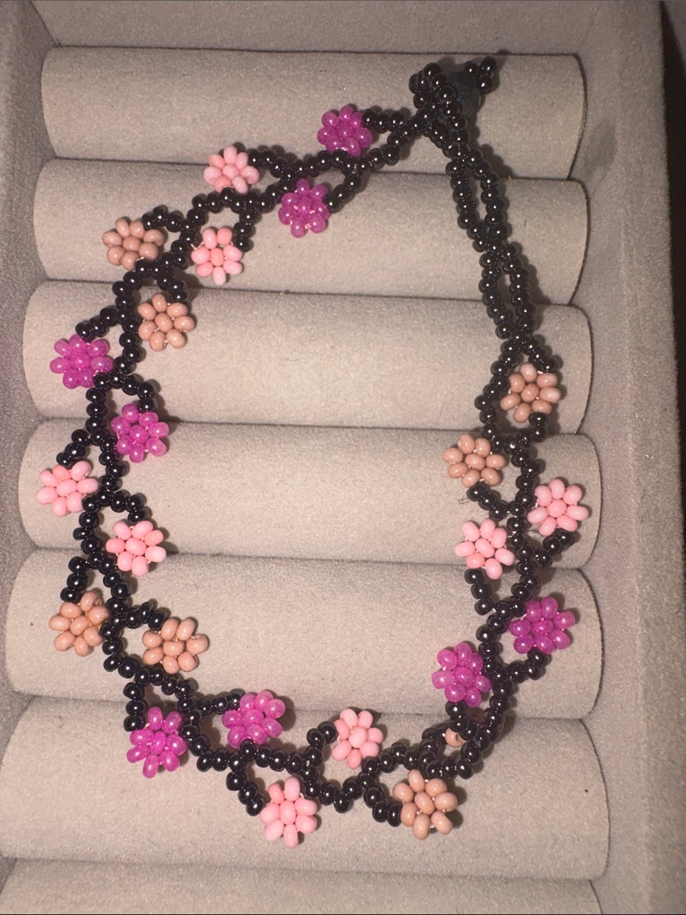 Handcrafted Black Beaded bracelet  with Pink & Purple Flower Accents